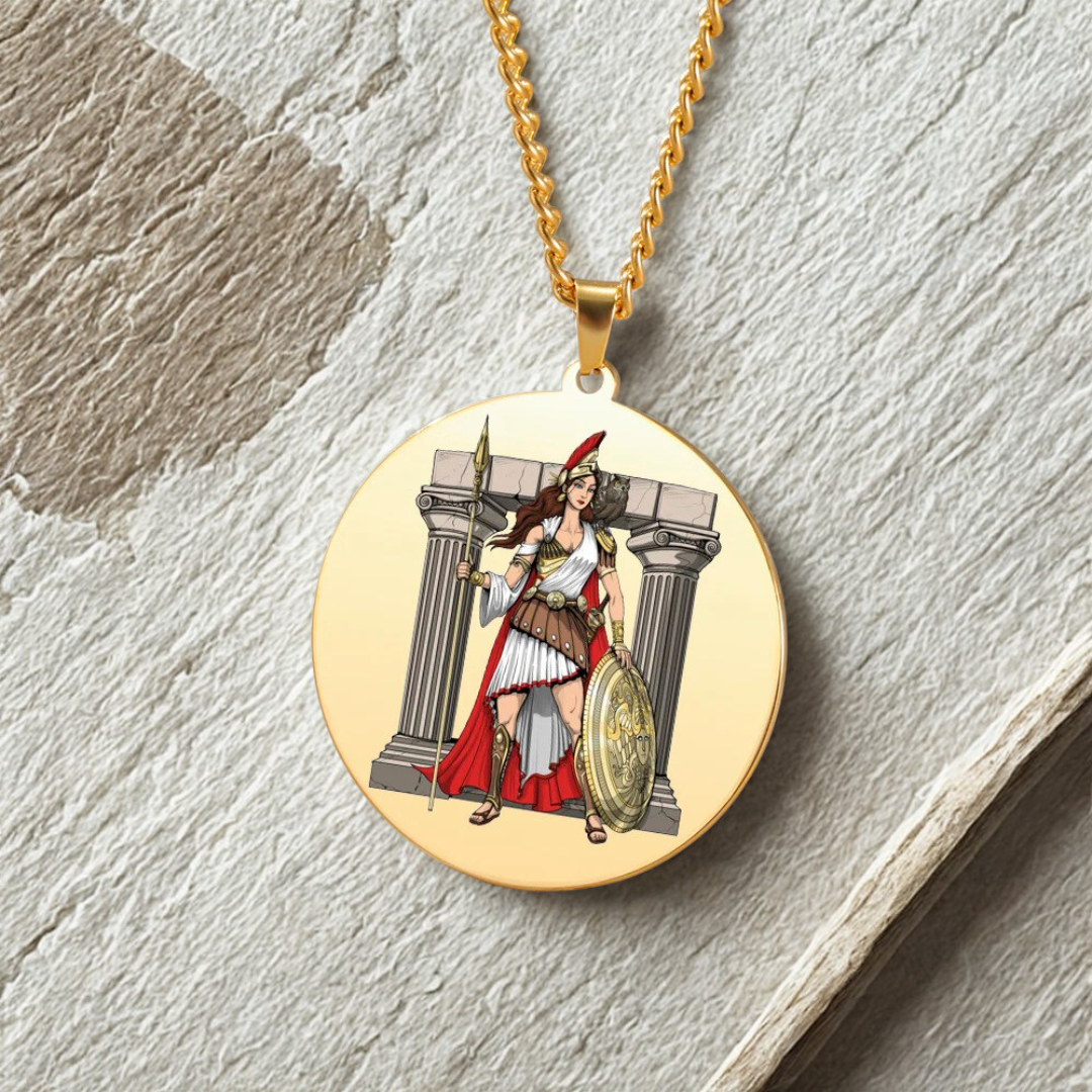 Gold necklace with a pendant featuring a Goddess Athena design on a stone surface