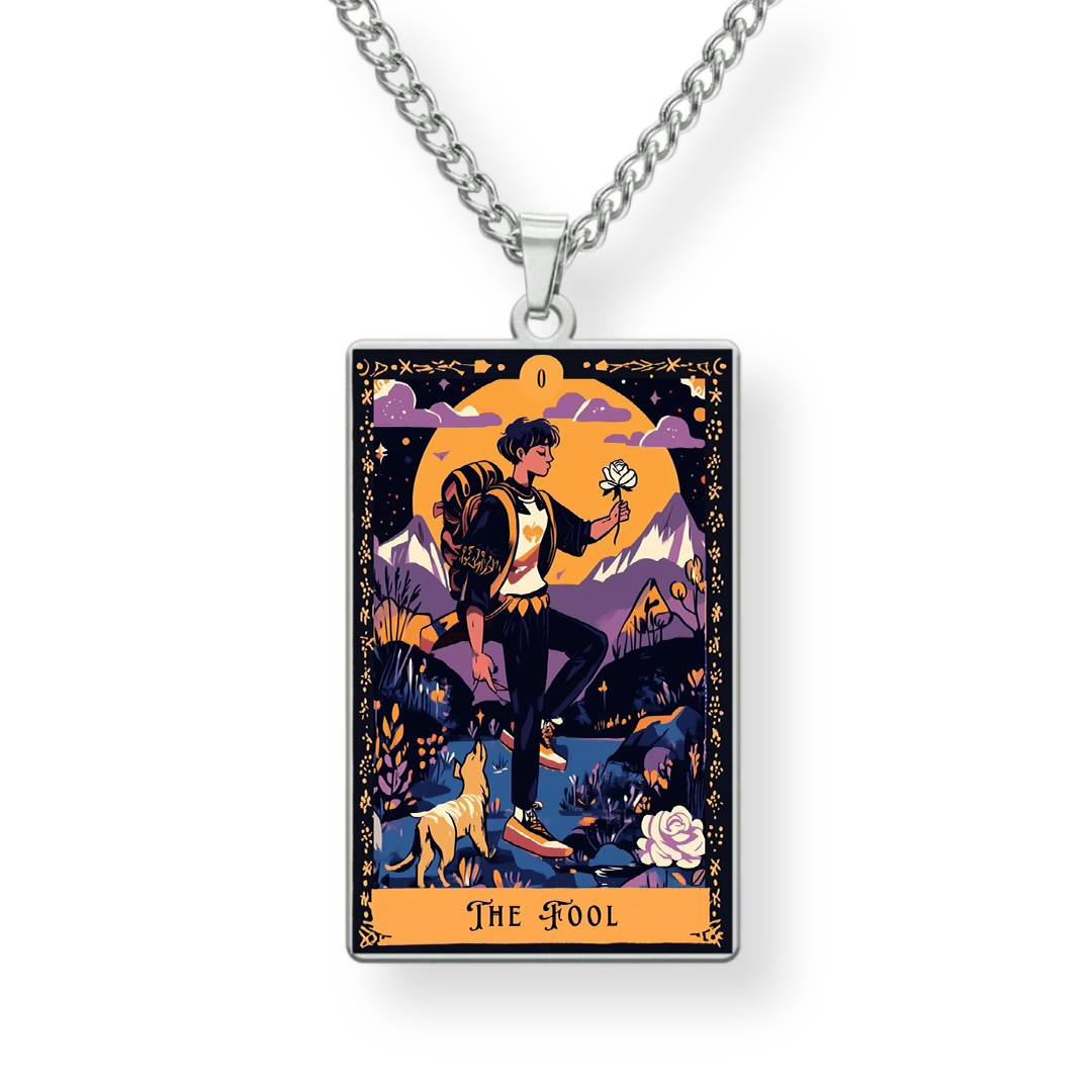 Necklace with 'The Fool' tarot card pendant on a white background