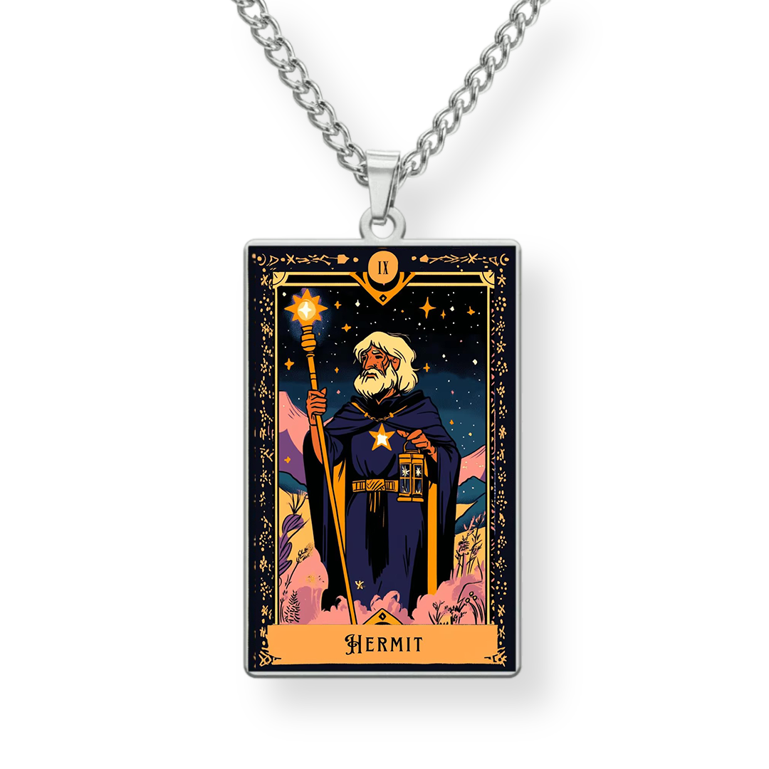 Tarot card-style pendant with 'Hermit' illustration on a chain against a white background