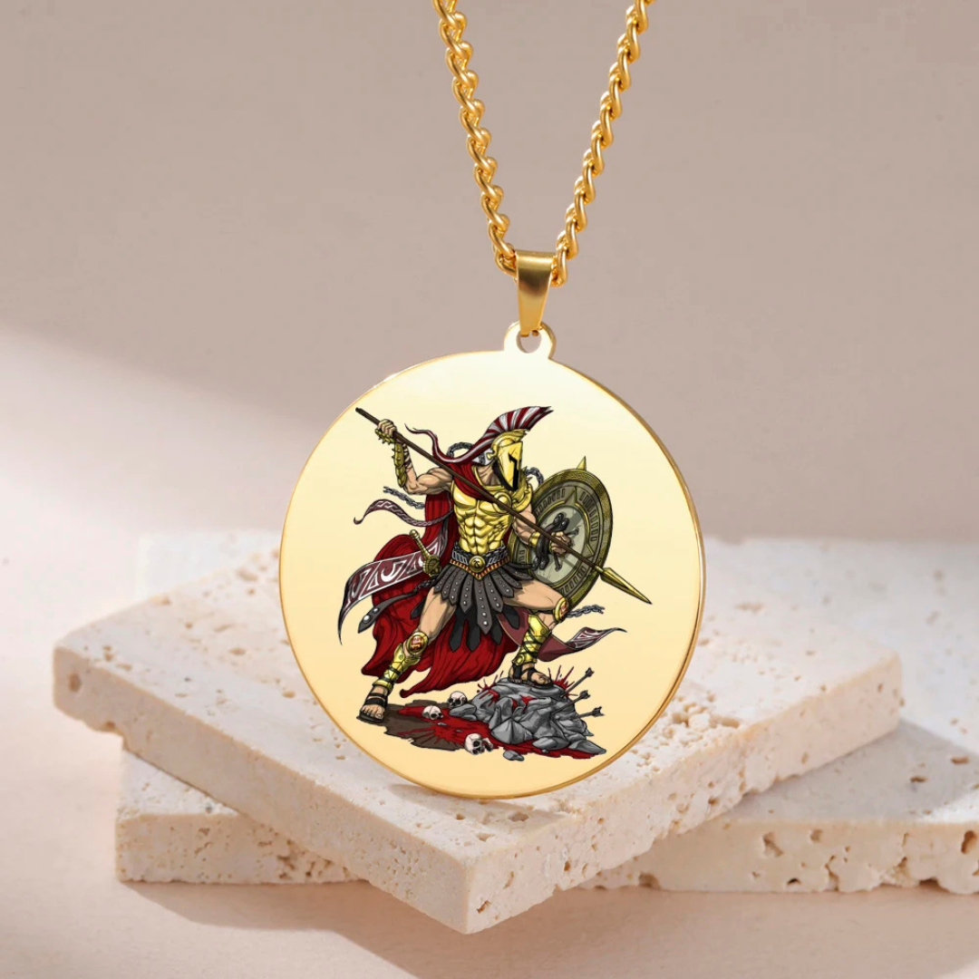 Gold necklace with the Greek God Ares as a warrior pendant on a beige background