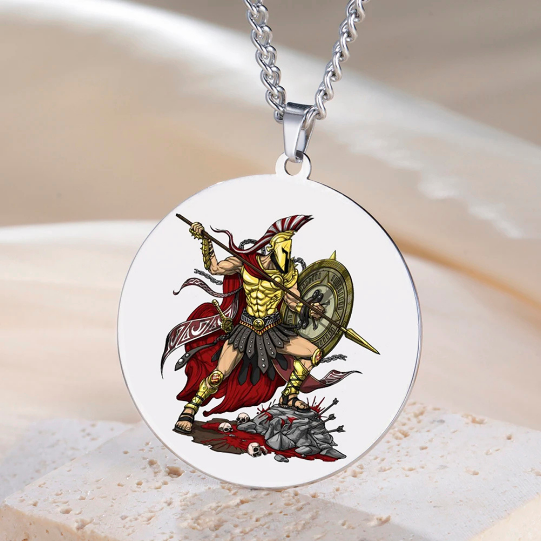 Circular pendant with the Greek God Ares as a warrior design on a chain against a beige background