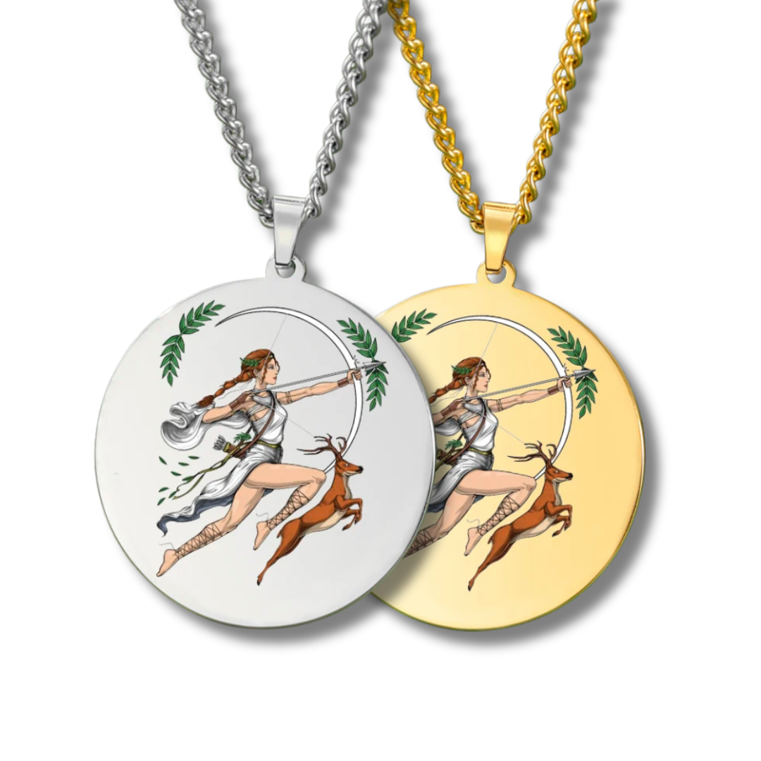 Two circular pendants on chains, one silver and one gold, featuring an illustration of the Goddess Artemis with a bow and arrow and two deer.