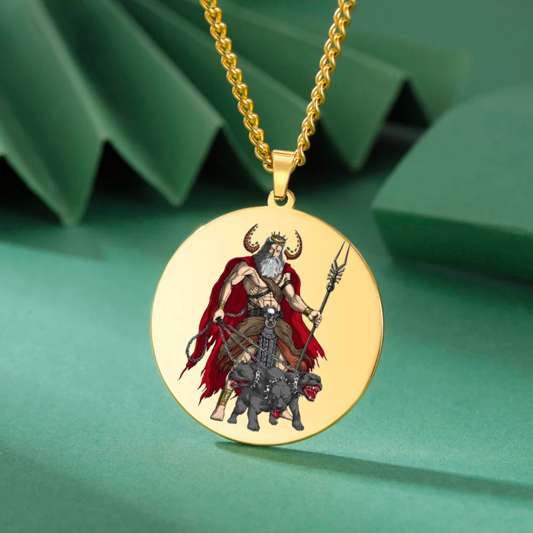 Gold pendant with a Hades & Cerberus design on a green background