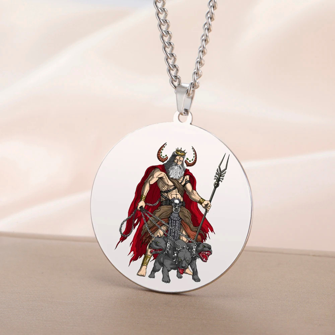 Medallion with a Hades & Cerberus design on a chain against a beige background