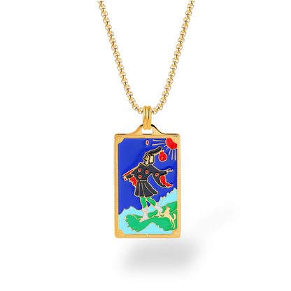 Colorful pendant on a gold chain against a white background