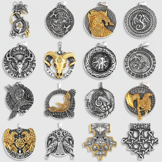 Collection of various metal pendants with different designs on a black background