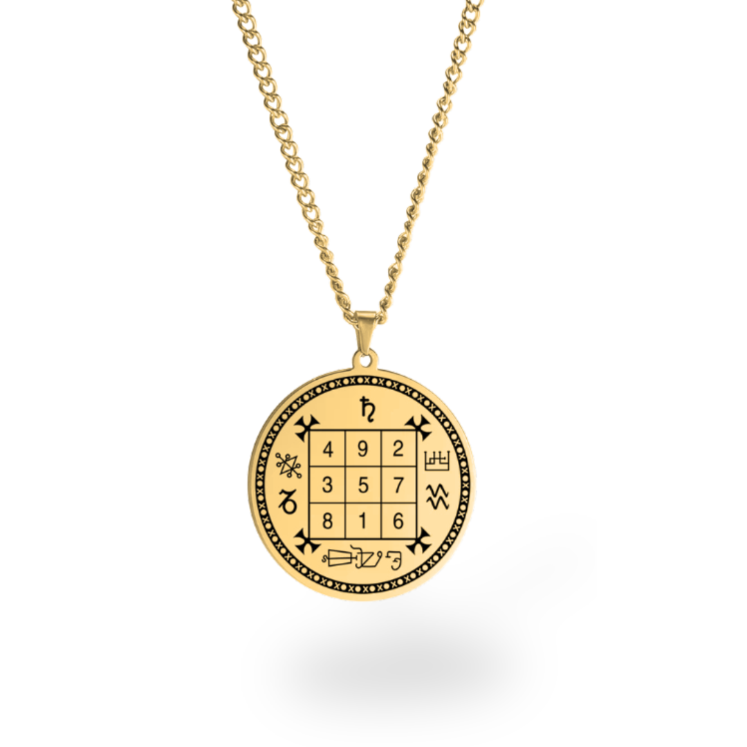 A gold pendant necklace featuring a circular charm with a black engraved 3x3 magic square grid, mystical symbols, and decorative borders, suspended from a gold chain against a white background.