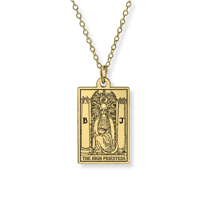 A gold-toned tarot card pendant necklace featuring 'The High Priestess' card design, suspended from a matching chain against a plain white background.