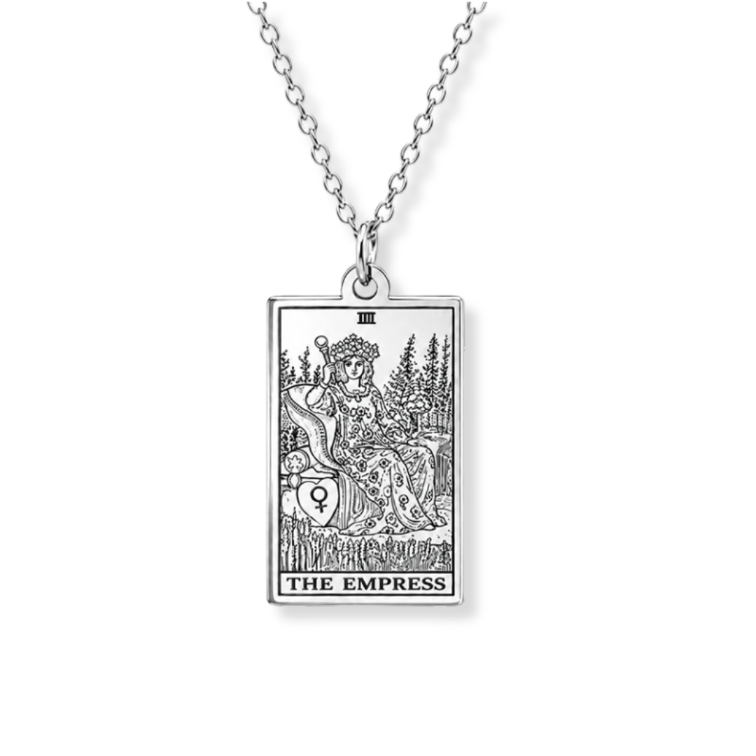A silver-toned necklace featuring a rectangular pendant engraved with the 'The Empress' tarot card design, shown against a plain white background.