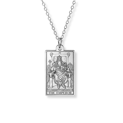 A silver-toned necklace featuring a rectangular pendant engraved with the 'The Emperor' tarot card design, suspended from a matching chain against a plain white background.