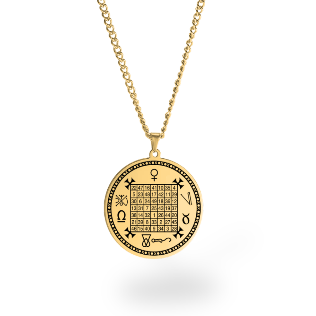 A gold-toned chain necklace with a round pendant featuring an engraved magic square grid and astrological symbols, shown on a clean white background.