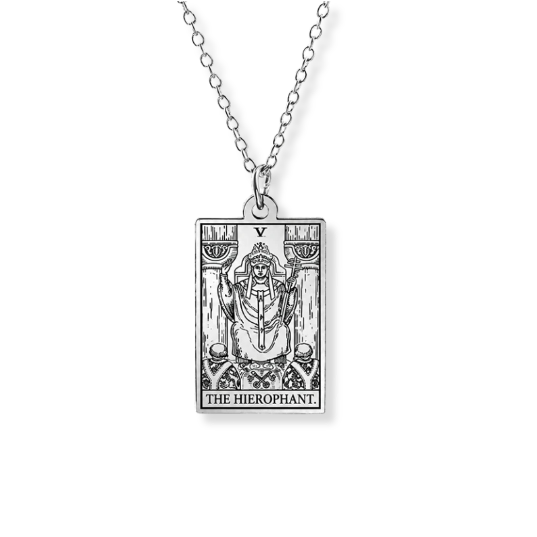 A silver-toned metal pendant necklace featuring the 'The Hierophant' tarot card design, suspended from a delicate link chain against a plain white background.