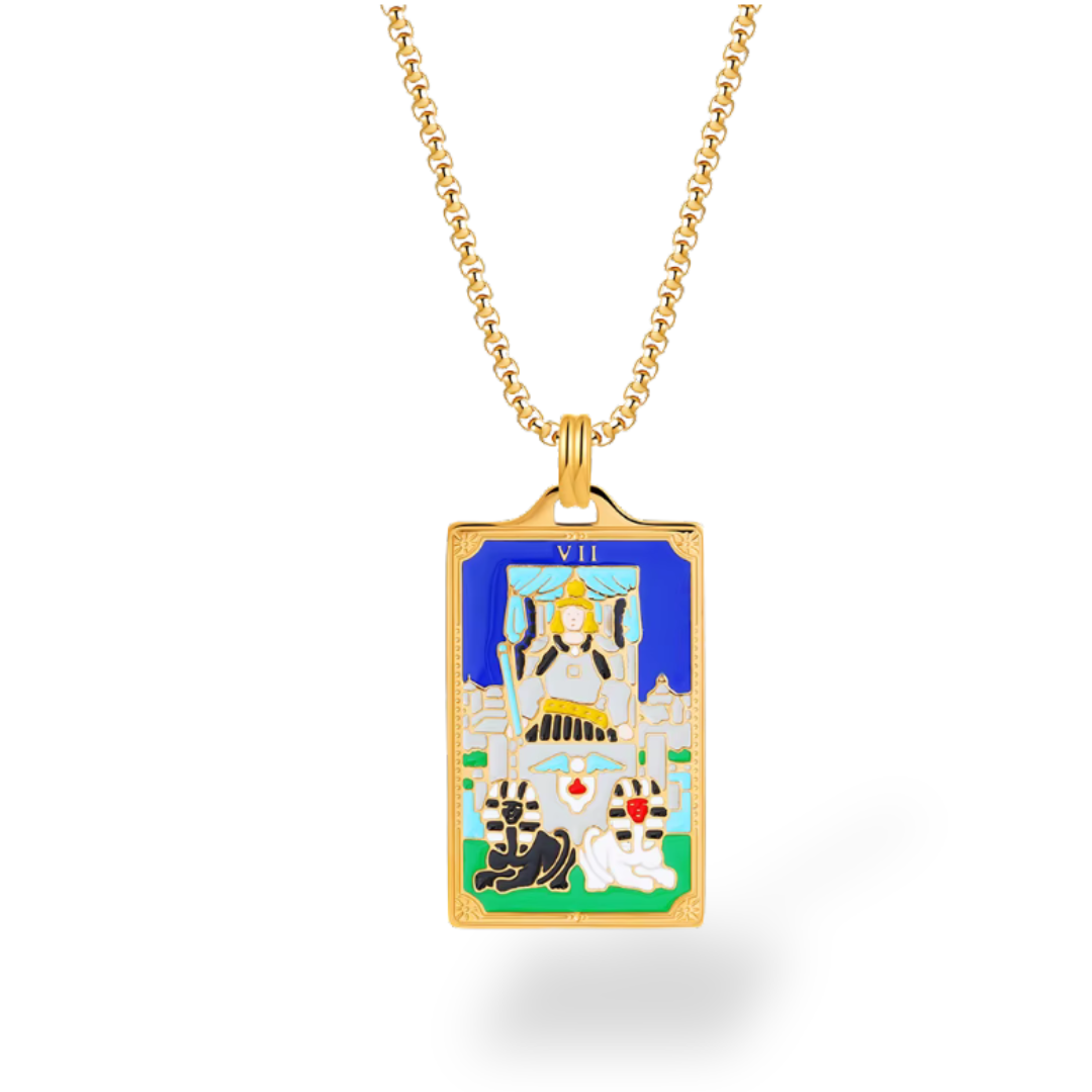 Gold necklace with a tarot card pendant on a white background