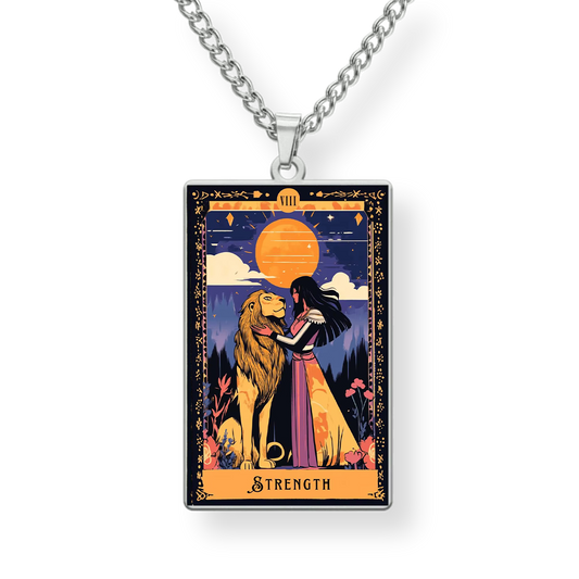 Necklace with a pendant featuring a tarot card design of a woman and lion with 'Strength' text on a white background.