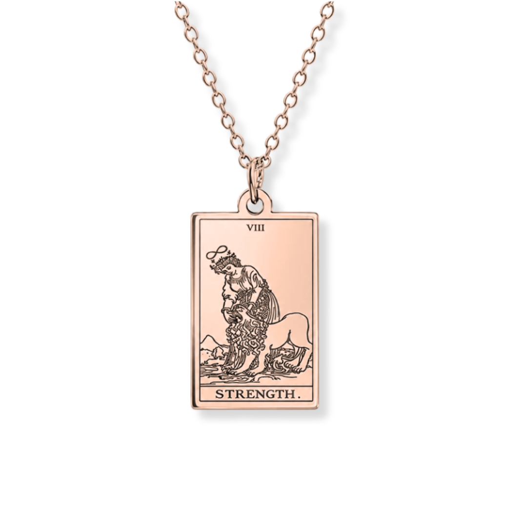 A rose gold tarot card pendant necklace featuring the 'Strength' card (VIII), suspended from a delicate rose gold chain against a clean white background.
