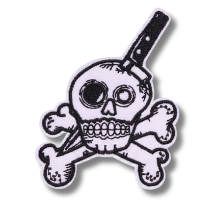 Skull and crossbones patch with a knife on a white background