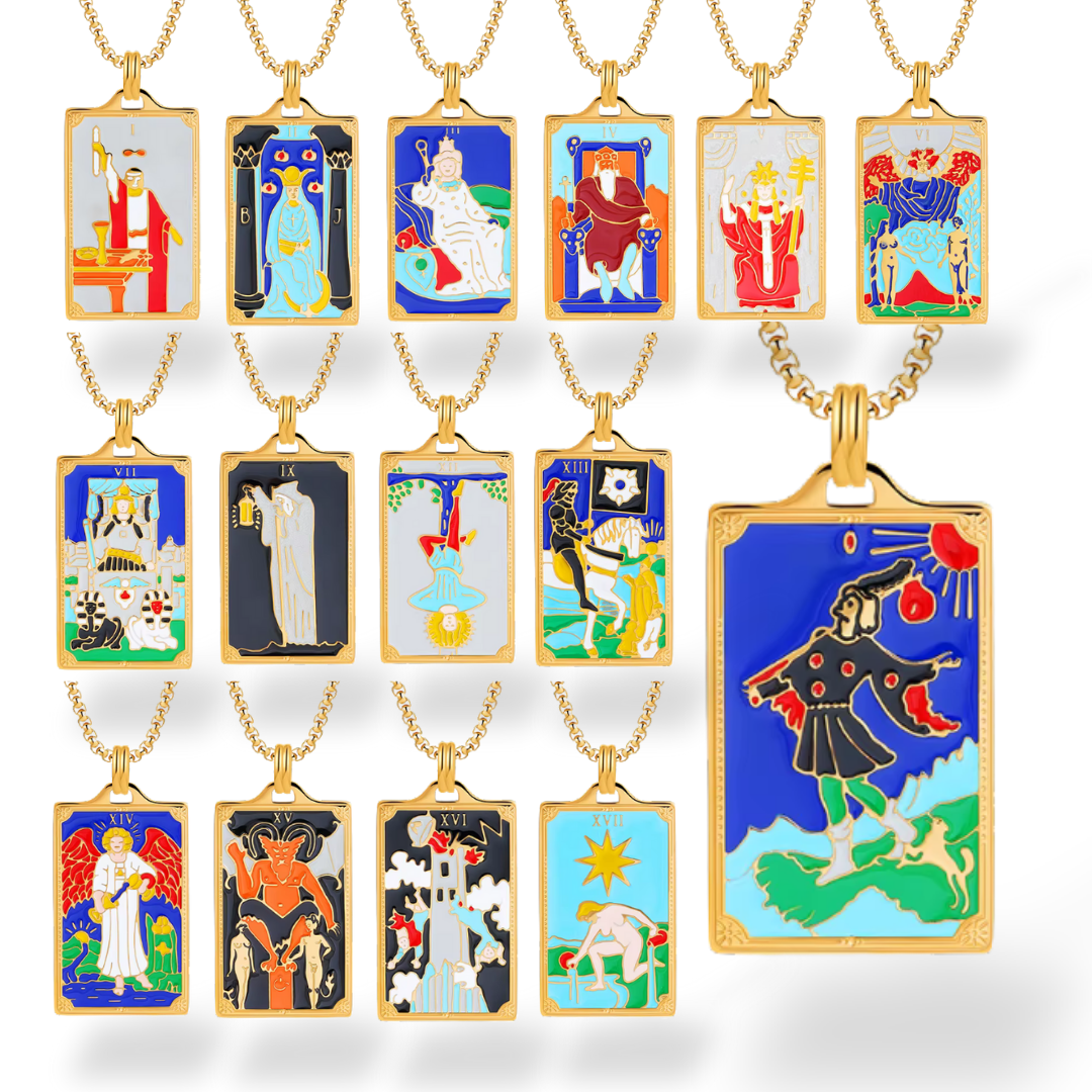 Collection of tarot card-themed pendants on gold chains against a white background
