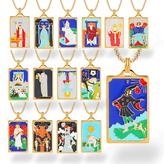 Collection of tarot card-themed pendants on gold chains against a white background