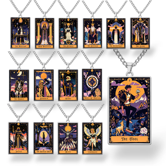 Collection of tarot card-themed necklaces on a white background