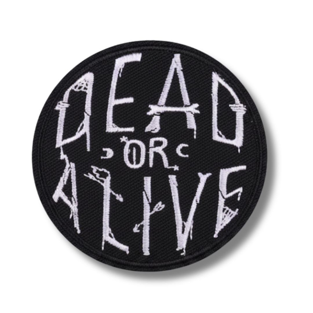 Round patch with 'Dead or Alive' text on a white background