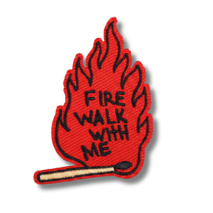 Red flame-shaped patch with 'Fire Walk With Me' text on a white background