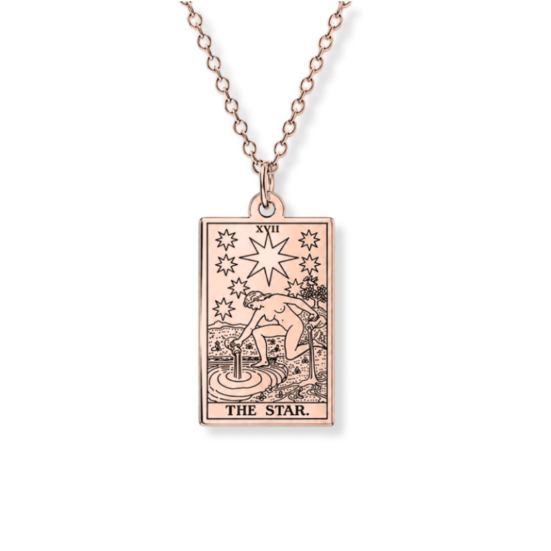 A rose gold tarot card pendant necklace featuring 'The Star' card design, suspended from a matching rose gold chain against a plain white background.