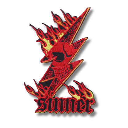 Red and black embroidered patch with 'Sunset' text on a white background