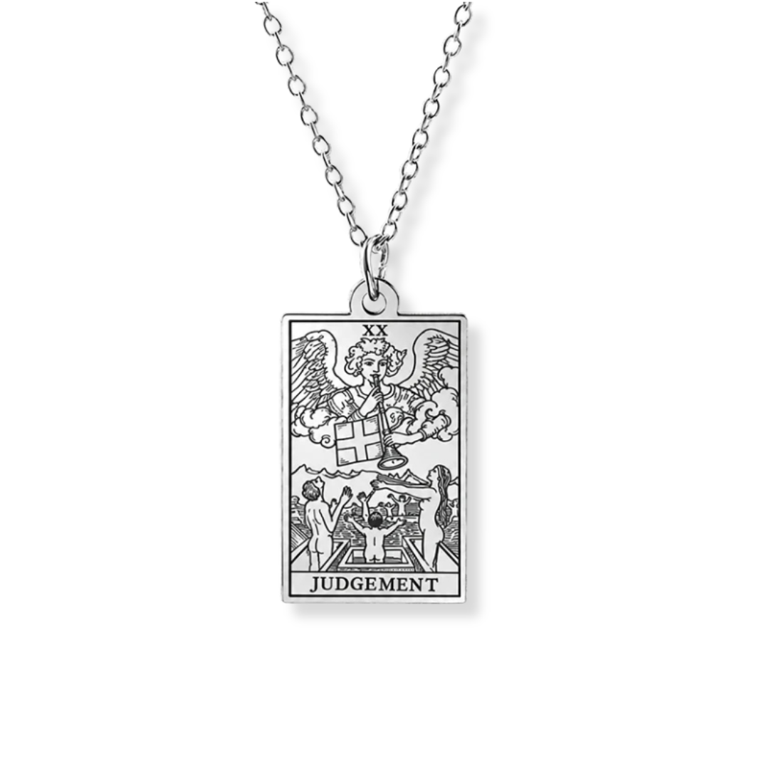 A silver-toned metal pendant necklace featuring the 'Judgement' tarot card design, suspended from a matching chain against a plain white background.