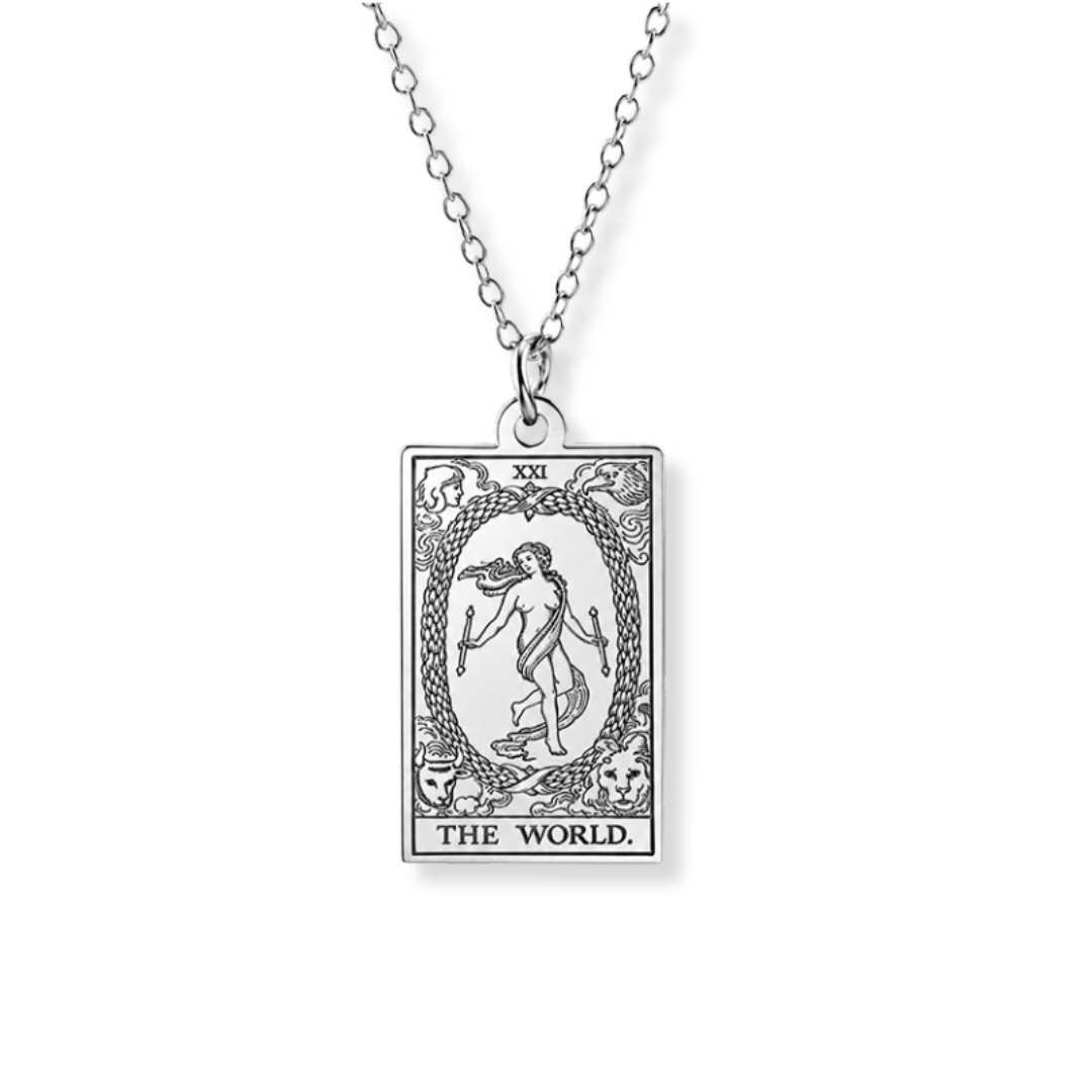 A silver-toned tarot card pendant necklace featuring 'The World' card design, suspended from a matching chain against a plain white background.