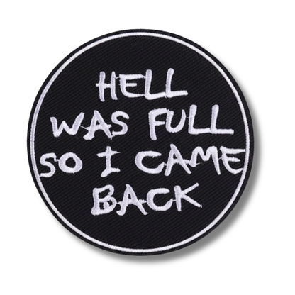 Round black patch with white text 'HELL WAS FULL SO I CAME BACK' on a white background