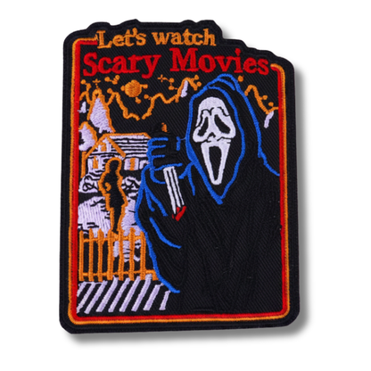 Embroidered patch with a ghostly figure and text 'Let's watch Scary Movies' on a white background
