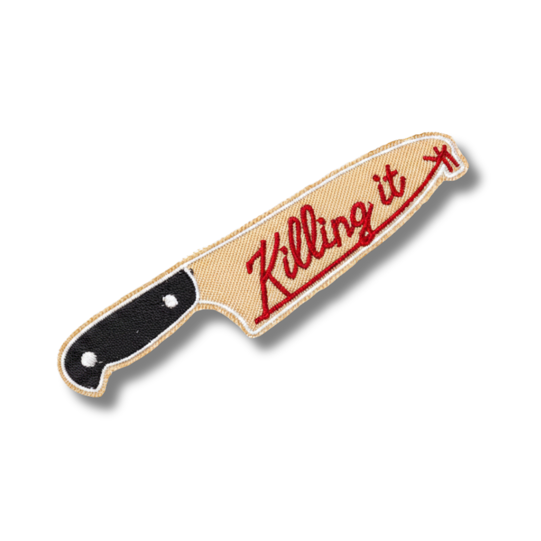 Patch of a knife with 'Killing it' text on a white background