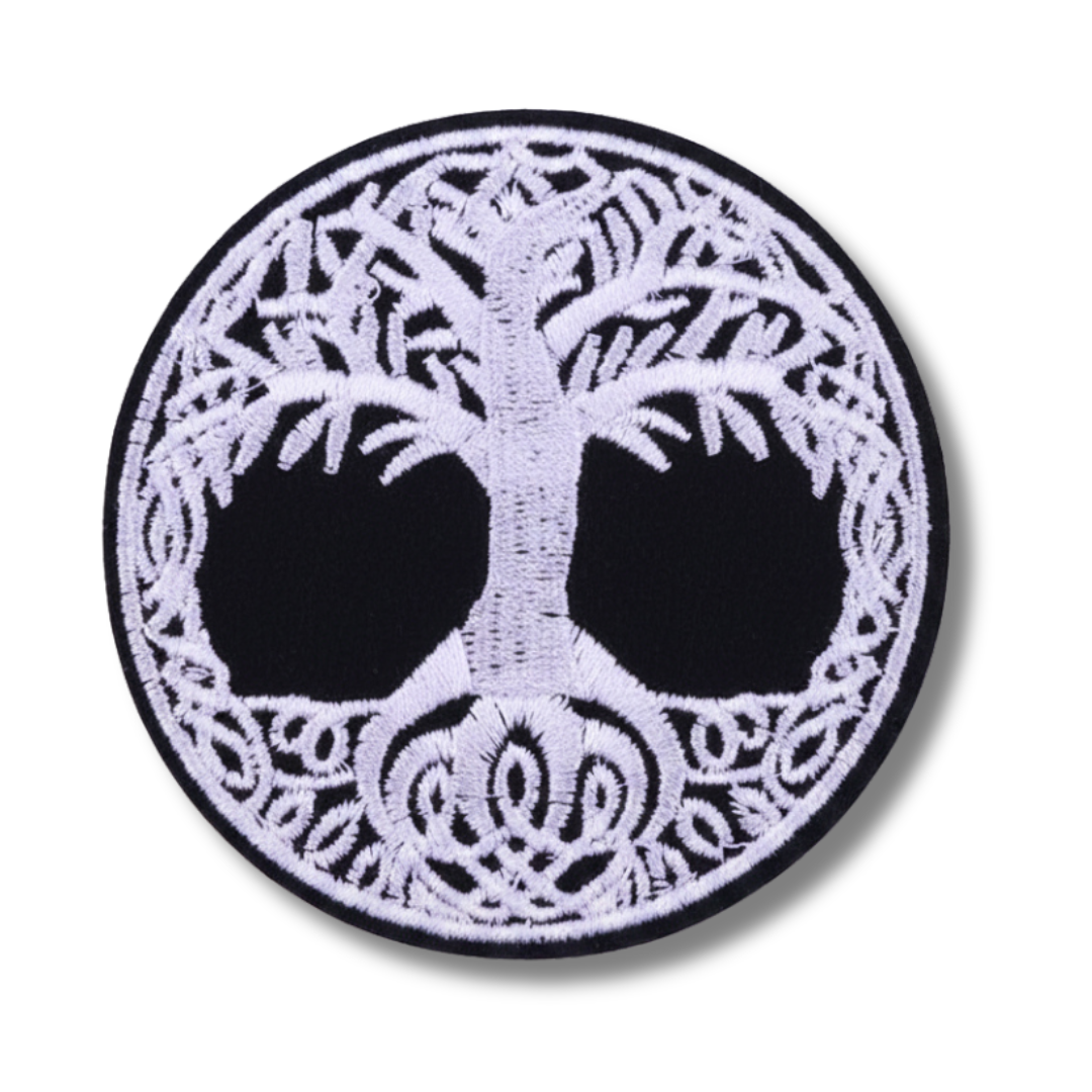 Circular patch with tree of life design on a white background