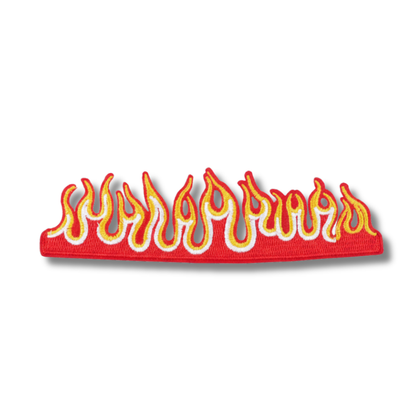 Flame-shaped patch with red background and yellow flames on a white background