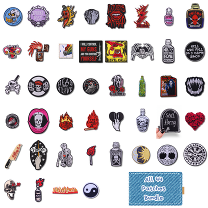 A collage of many small embroidered patches and pins arranged on a white background, plus a blue fabric pouch labeled 'All 44 Patches Bundle.' The patches feature horror-themed designs including skulls, flames, bottles, a vampire face, a skeleton, a yin-yang symbol, and text such as 'Dead Alive,' 'Still Horny,' 'Hell Was Hell,' and 'All Out Loud.