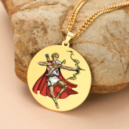 Gold pendant with a Greek God Apollo design on a stone surface