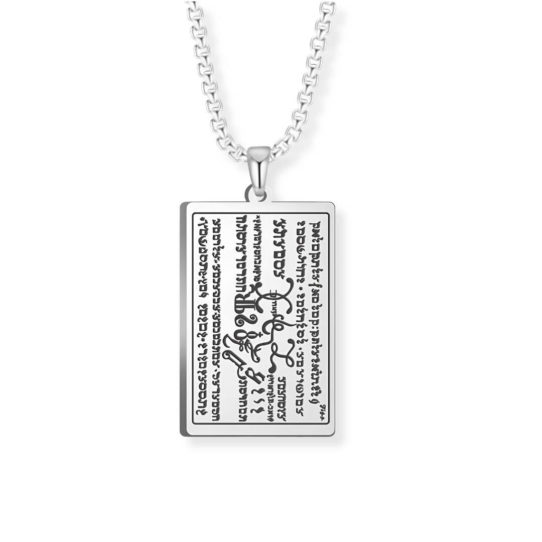 A silver rectangular pendant necklace featuring engraved script from the 6th and 7th Books of Moses, suspended from a silver box chain against a plain white background.