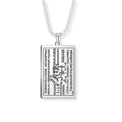 A silver rectangular pendant necklace featuring engraved script from the 6th and 7th Books of Moses, suspended from a silver box chain against a plain white background.