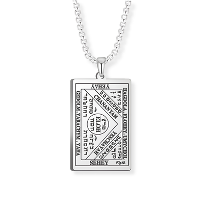 A silver rectangular pendant necklace featuring engraved script from the 6th and 7th Books of Moses, suspended from a silver box chain against a plain white background.