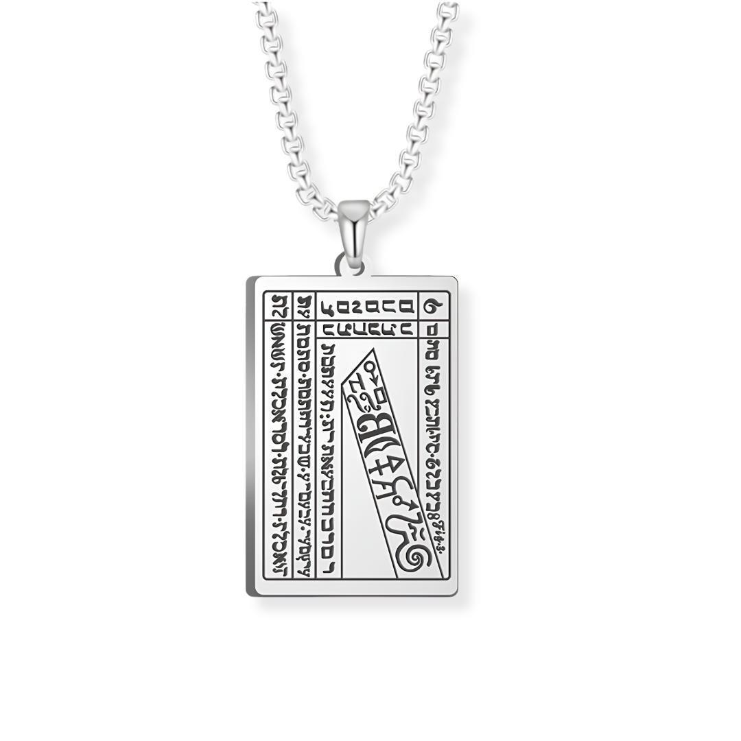 A silver rectangular pendant necklace featuring engraved script from the 6th and 7th Books of Moses, suspended from a silver box chain against a plain white background.