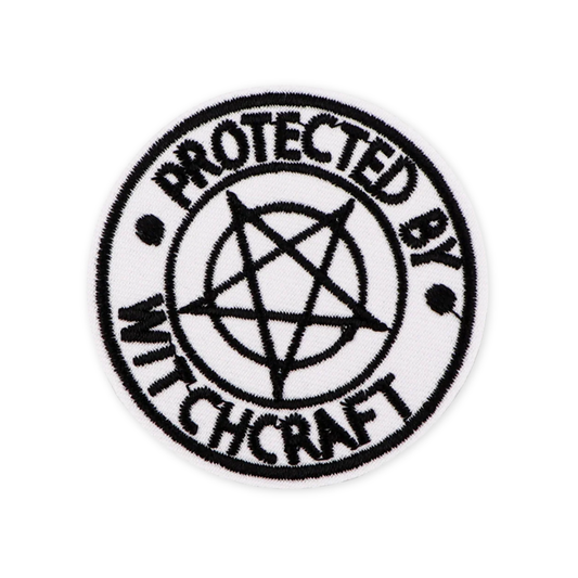Embroidered patch with 'Protected by Witchcraft' text and pentagram design on a white background